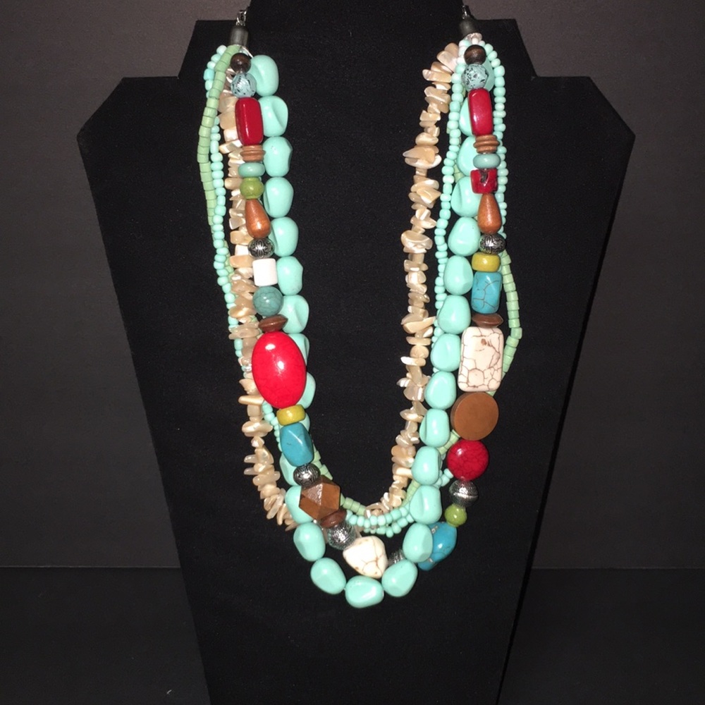 Turquoise colored multi strand necklace